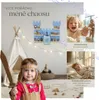 A collage showing a child dressed as a knight in front of a teepee, with a blue castle-shaped shelf mounted on the wall. Smaller inset images show a laughing child and a sleeping baby. Náhled obrázku produktu