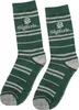 A pair of green and gray striped socks with the Slytherin logo. Produktbild-Vorschau