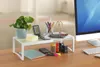 A desk organizer with various office supplies on a wooden desk. Anteprima dell’immagine prodotto