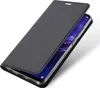 A dark gray flip case for a smartphone is shown open, revealing the phone's screen. Produktbild-Vorschau