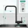 A black kitchen faucet with dimensions overlaid on the image, placed in front of a sink and a window. Produktbild-Vorschau