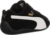 A side view of a black Puma Speedcat sneaker with white accents and gold branding. Voir les images du produit