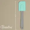 A turquoise and gray spatula is shown against a light gray background, with a measurement indicator and a brand logo. Anteprima dell’immagine prodotto