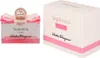 A perfume bottle and its box are displayed side-by-side against a white background. Voir les images du produit