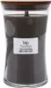 A large glass candle with a wooden lid and a label. Podgląd zdjęcia produktu
