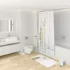 A clean, modern bathroom with a sink, toilet, and bathtub. Produktbild-Vorschau