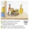 A stainless steel turntable holding various jars and bottles of food items, placed on a wooden shelf. Anteprima dell’immagine prodotto