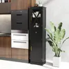 A black storage cabinet with a glass door is shown next to a stack of kitchen appliances in a modern kitchen setting. Náhled obrázku produktu