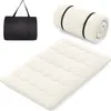 A mattress, a rolled-up mattress, and a carrying bag are displayed against a white background. Produktbild-Vorschau