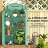 A greenhouse with plants on shelves, next to a wooden fence and a watering can. Voir les images du produit