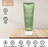 A tube of Niyok toothpaste is displayed on a wooden shelf against a light background, with various certifications and product benefits shown as icons and text. Anteprima dell’immagine prodotto