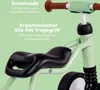 Close-up of a child's balance bike with descriptive text overlays. Anteprima dell’immagine prodotto