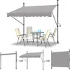 An outdoor dining set with a retractable awning. Náhľad obrázku produktu