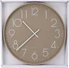 A taupe wall clock with white numbers and hands, presented in its packaging. Produktbild-Vorschau