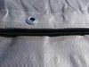 A close-up view of a silver tarp with grommets. Produktbild-Vorschau