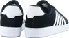 A pair of black and white K-Swiss shoes shown from the back and side. Produktbild-Vorschau