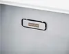 A close-up of a stainless steel sink with a brand logo. Produktbild-Vorschau