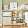 A kitchen or dining room setting with a buffet cabinet. Voir les images du produit