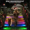 A child and a dog on illuminated stairs in the rain. Produktbild-Vorschau