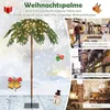 A collage of images showcasing a Christmas palm tree in various settings, including commercial spaces, outdoor decorations, and home interiors. Voir les images du produit