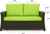 A studio shot of a two-seater sofa with green cushions. Anteprima dell’immagine prodotto