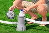 A person is shown inserting a filter into a pool pump on a grassy area. Produktbild-Vorschau
