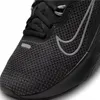 A close-up view of the toe area of a black Nike sports shoe. Produktbild-Vorschau