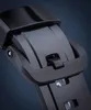 A close-up shot of a black watch buckle. Produktbild-Vorschau