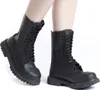 A pair of black lace-up boots on a white background. Produktbild-Vorschau