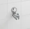 A chrome shower head holder mounted on a white tiled wall. Anteprima dell’immagine prodotto