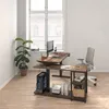 A home office setup with a height-adjustable desk, computer, and chair. Produktbild-Vorschau