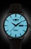 A close-up studio shot of a men's wristwatch against a black background. Náhľad obrázku produktu