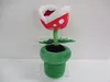 A plush toy of a Piranha Plant from the Super Mario video game series, shown in a pot. Anteprima dell’immagine prodotto