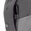 A close-up view of a gray backpack showing a zippered pocket with a smartphone inside and a brand logo. Anteprima dell’immagine prodotto