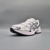 A single white and silver ASICS sneaker is shown against a plain gray background. Produktbild-Vorschau