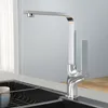 A modern chrome kitchen faucet is shown in a kitchen sink. Anteprima dell’immagine prodotto