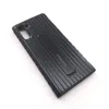 A black Samsung phone case with a kickstand is shown on a white background. Produktbild-Vorschau