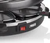 A close-up shot of a raclette grill, focusing on the power switch and the Princess brand logo. Produktbild-Vorschau