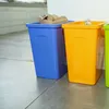 Three colorful recycling bins are lined up on a floor. Náhľad obrázku produktu