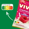 A marketing image showing a package of VIVIL Creme Life raspberry candies, with a Nutri-Score graphic and an arrow pointing to it. Produktbild-Vorschau
