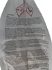 Close-up of a white plastic bag with text and hazard symbols printed on it. Produktbild-Vorschau