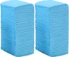 Two stacks of blue disposable dog pee pads. Náhled obrázku produktu