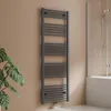 A dark gray towel radiator is mounted on a tan wall next to a bathtub with a glass shower screen. Produktbild-Vorschau