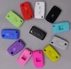 A collection of silicone key covers arranged on a gray surface. Produktbild-Vorschau