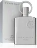 A silver perfume bottle and its packaging are displayed against a white background. Náhľad obrázku produktu