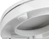 A close-up, low-angle view of the underside of a white toilet seat, showing a small white button mechanism. Produktbild-Vorschau