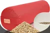 A red yoga bolster is shown with a pile of grain and a close-up of the bolster's filling. Náhľad obrázku produktu