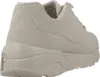 Rear view of a beige sneaker. Voir les images du produit