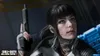 A close-up marketing image of a female character from Call of Duty: Black Ops 7, holding a weapon. Produktbild-Vorschau