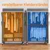 Two halves of a portable wardrobe are shown, one filled with orange-tinted clothing and the other with blue-tinted clothing. Voir les images du produit